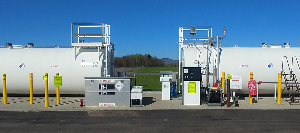 Fuel storage tanks and equipment at facility.